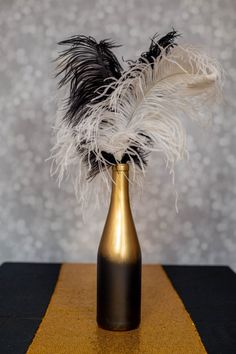 8 Elegant DIY Great Gatsby Centerpieces | DIY Centerpieces Great Gatsby Door Decorations, Art Deco Wedding Centerpieces Diy, Roaring 20s Centerpieces Diy, 1920s Holiday Party, 1920s Centerpieces Roaring 20s, 20s Decorations 1920s Party, Diy Gatsby Party, Gatsby Centerpiece Ideas, Great Gatsby Centerpiece