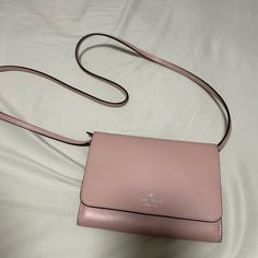 New Baby Pink Kate Spade Wallet Purse. Unused Without Tag With A Lot Of Card Holders And Two Large Pockets On The Inside Pink Bifold Travel Bag, Blush Rectangular Travel Wallet, Formal Pink Kate Spade Wallets, Chic Pink Crossbody Wallet, Kate Spade Everyday Bifold Bag, Compact Pink Leather Bag, Kate Spade Pink Wallet For Everyday Use, Elegant Blush Wallet, Elegant Blush Wallet For Everyday Use