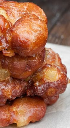 a pile of fried food sitting on top of a white plate