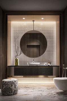 a modern bathroom with an oval mirror above the sink and large round bowl on the counter