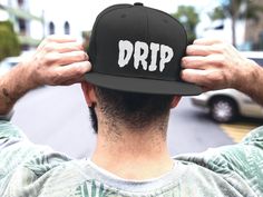 Come Through Drippin in this  Yupoong 6-panel cap! A a modern take on a classic design. This hat is the perfect choice thanks to its sharp styling, spirited color and lively green underbill. The old-school snapback closure and iconic flat bill add a subtle charm that takes you back to the good ol' days. .: 80% Acrylic 20% Wool .: Green underbill .: 7-position adjustable snap closure .: Structured and high profile silhouette Rave Edm, Hunting Hat, Flat Brim Hat, Logo Symbol, Personalized Fathers Day Gifts, Sport Hat, Gifts For New Dads, Dad Caps, Dad Birthday Gift