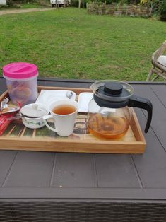 there is a tray with tea and other items on it