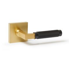 an image of a brass door handle on a white background