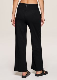 Whether you pair it with your favorite denim jacket or a sports bra for yoga, our Lotus Wide Leg Pant is the ultimate studio-to-street piece. A relaxed, wide leg design keeps you comfortable and on trend while the flat-front elastic waistband ensures an ultra flattering look and fit without sacrificing comfort. Complete with side pockets that provide the functionality you're looking for, you can unwind and reset in these versatile women's sweatpants. Comfortable Stretch Wide Leg Yoga Pants, Black Yoga Bottoms With Comfort Waistband, Black Bottoms With Comfort Waistband For Yoga, Comfortable Wide Leg Loungewear, Black Mid-rise Yoga Bottoms, Comfort Waistband Black Yoga Bottoms, Comfortable Wide Leg Activewear For Loungewear, Comfortable Relaxed Fit Yoga Pants For Fall, Comfortable Full-length Relaxed Fit Yoga Pants