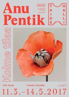 an orange flower with the words annu pentik on it's side