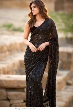 Bollywood Replica SareeBollywood Kriti Sanon Inspired Black  georgette saree with 3mm sequins work and sequins lace border work. Blouse in banglori silk unstitch material .Shipping time 5-7 days .Buy this Saree at Kollybollyethnics and make your occasion very special !!. With Express Free Shipping and Custom Stitching, Shop Bollywood Kriti Sanon Inspired Black sequins georgette saree online at kollybollyethnics from India with free worldwide shipping. Kriti Sanon Saree, Black Sari, Kriti Sanan, Sequence Saree, Sarees For Girls, Saree Bollywood, Sequin Saree, Indian Designer Sarees, Party Sarees