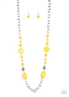 Varying in size and shape, flat and faceted yellow beads link with a pair of classic silver beads along sections of bold silver links, coalescing into a colorful display across the chest. Features an adjustable clasp closure. Hanging Necklaces, Yellow Necklace, Costume Jewelry Necklaces, Paparazzi Accessories, Paparazzi Jewelry, Boutique Jewelry, Necklace Earring Set, Faceted Bead, Black Beads