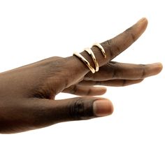 The Amali Open Ring stands out effortlessly with its subtle, soft curves. Perfect to wear solo or with your favorite ring stack. In Swahili, Amali means hope. Handcrafted by artisans in Kenya with 24k gold plated brass using traditional techniques. Maximum thickness: 0.11in (3mm) Minimum thickness: 0.07in (2mm) Height: 1in (25.4mm) Size Chart Open Ring Gold, Stackable Necklaces, Stacked Earrings, Ring Stack, Ring Stand, Stackable Bracelets, Open Ring, Favorite Rings, Chain Choker