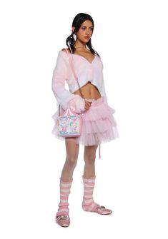 This cardigan has a fuzzy knit construction with an ombre design, long balloon sleeves, a cropped fit, and front button closures. Cat Clown, Runway Fashion Couture, Circus Tent, Ombre Design, Sugar Thrillz, Fashion Couture, Bear Graphic, Long Balloons, Tutu Skirt