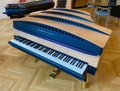 there are three musical instruments sitting on top of each other in the room with hard wood flooring