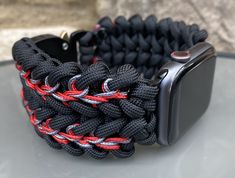 "FREE USPS PRIORITY MAIL SHIPPING FOR DOMESTIC US ORDERS (Includes U.S. Military APO/FPO Address Overseas) Thank you for visiting our shop \"Cording 2U\". A veteran owned business. Handcrafted Paracord wearables customized \"According To You\". Handcrafted with 100% Nylon Paracord \"MADE IN USA\" Our Products include: 🔹Custom handcrafted watch bands according to your wrist size, style, and color of choice. If you don't see it in our page yet, please contact us and we can discuss your options. ? Adjustable Durable Black Apple Watch Band, Black Paracord Bracelet Strap Watch Band, Adjustable Black Watch Bands For Customization, Black Watch Bands With Bracelet Strap For Customization, Custom Handmade Black Watch Bands, Durable Black Watch Bands For Customization, Handmade Black Apple Watch Band For Outdoor, Custom Black Adjustable Apple Watch Band, Custom Black Apple Watch Band With Bracelet Strap