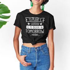 Introducing Kooskadoo's "To Plant A Garden Is To Believe In Tomorrow" unisex t-shirt – a charming and meaningful way to celebrate the beauty of gardening and the hope it brings for the future. Crafted from high-quality Bella-Canvas fabric, this t-shirt combines comfort with style. Its flattering design ensures a perfect fit for all body types. Whether you're tending to your plants or enjoying a casual day out, this tee promises both comfort and elegance. The inspiring quote emblazoned on the fro Plant A Garden, T Shirt Flowers, Bella Canvas Tees, The Hope, A Garden, Body Types, Garden Plants, The Beauty, Bella Canvas