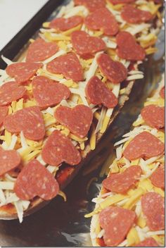 slices of pepperoni and cheese on top of toasted bread