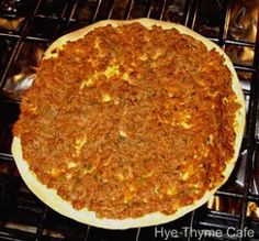 a pizza sitting on top of an oven rack