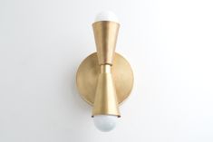 SCONCE MODEL No. 4717- Mid Century Modern Wall Lights with a Raw Brass finish. Designed and produced by MODCREATIONStudio at Peared Creation Vanity Lights Bathroom, Geometric Light, Black Sconces, Geometric Lighting, Bathroom Sconces, Brass Wall Light, Bathroom Wall Sconces, Modern Sconces, Gold Wall