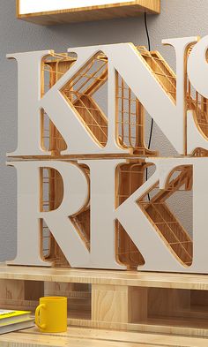 a man sitting on a bench reading a newspaper in front of a sign that reads no rkv