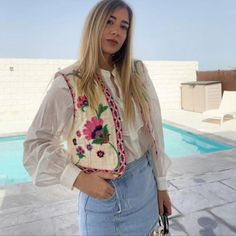 Capture The Essence Of Bohemian Chic With Our Embroidered Vest, A Wardrobe Essential For Every Free Spirit. Its Versatile Cropped Design Lends Itself To Effortless Layering In The Summer Or Standalone Wear In The Fall. Adorned With Intricate Floral Embroidery, It Adds A Whimsical Touch To Any Ensemble. Whether You're Off To A Festival, A Picnic, Or Simply Exploring The Town, This Vest Promises To Make A Statement Wherever You Go. Boho Women's Embroidered Vest Details: Boho Vest Vintage Floral Em Casual Pink Top With Floral Embroidery, Casual Pink Embroidered Top With Floral Design, Casual Pink Floral Embroidered Top, Pink Embroidered Top For Spring Vacation, Pink Embroidered Top For Vacation In Spring, Casual Pink Embroidered Top For Vacation, Bohemian Vests, Embroidered Vest, Boho Vest