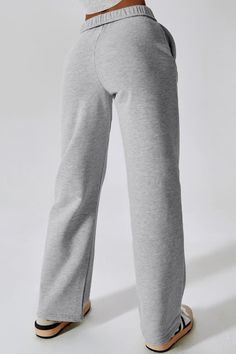 Look and feel your best in our straight leg high waisted sweatpants. Made with a soft and comfortable fabric, these pants are perfect for any occasion, from running errands to lounging at home. The high waist provides a flattering fit, while the straight leg silhouette elongates your figure. Available in three versatile colors, these sweatpants are sure to become a staple in your wardrobe. Features: High waisted for a flattering fit Straight leg silhouette elongates the figure Soft and comfortab Stretch Joggers For Loungewear With Straight Leg, Straight Leg Sweatpants With Ribbed Waistband, Stretch Joggers For Loungewear, High-waisted Pants For Leisure, Trendy Wide Leg Solid Color Sweatpants, Trendy Wide Leg Solid Sweatpants, Trendy Solid Color Wide Leg Sweatpants, Trendy Wide-leg Solid Sweatpants, Relaxed Fit Wide-leg Sweatpants For Athleisure