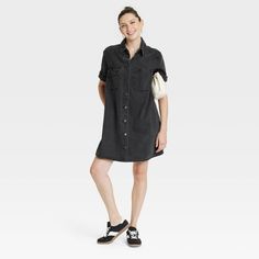 Spruce up your casualwear collection with this Short-Sleeve Mini Shirtdress from Universal Thread™. The short-sleeve shirtdress is made from midweight denim fabric for a breathable fit, while the collared neckline with front button-down closure provides ease of wear. It sports a double-stitched seam, pleated back, front placket and a back yoke for a smart look that's perfect for a variety of occasions. The flap chest pocket completes the design with functional flair. Universal Thread™: Found exc Short Sleeve Shirt Dress For Fall Daywear, Casual Fall Shirt Dress With Pockets, Casual Shirt Dress With Relaxed Fit For Fall, Casual Relaxed Fit Shirt Dress For Work, Casual Short Sleeve Cotton Dresses, Trendy Short Sleeve Summer Shirt Dress, Casual Cotton Short Sleeve Dresses, Casual Half Sleeve Summer Shirt Dress, Casual Short Sleeve Dresses For Daywear