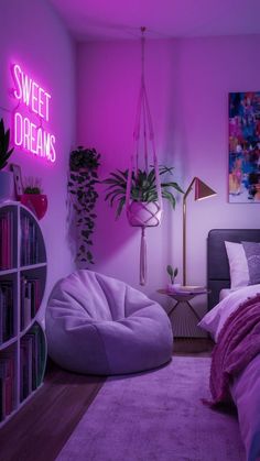 a bedroom with purple lighting and a bean bag chair