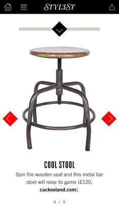 an industrial stool with wooden seat and metal frame, viewed from the front on a white background