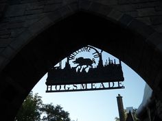 the entrance to hogsmeade is seen through an archway