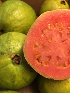 a close up view of some fruit that is cut in half