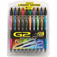 12 pens in a plastic case with different colors and writing on the inside of it