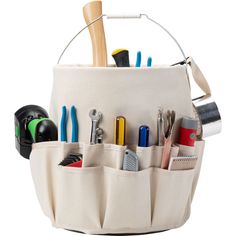 a white bucket filled with different types of tools and gadgets in front of a white background