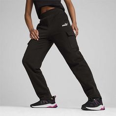 The PUMA Women's Mid Rise Straight Cargo Fleece Pant combines comfort, utility, and a relaxed, sporty look. Made from soft fleece fabric, these pants offer warmth and a cozy fit, making them perfect for lounging, outdoor activities, or casual wear. The mid-rise waistband provides a secure and comfortable fit, while the straight-leg design gives a flattering, relaxed silhouette. Featuring functional cargo pockets on the sides, these pants offer ample storage space for essentials. The subtle PUMA Sports Parachute Pants With Pockets And Straight Leg, Sportswear Cargo Pants For Workout, Straight Leg Parachute Pants For Sports, Sporty Bottoms With Pockets, Sportswear Relaxed Fit Cargo Pants For Sports, Sporty Sweatpants With Cargo Pockets For Outdoor Activities, Relaxed Fit Sportswear Cargo Pants For Sports, Relaxed Fit Cargo Pants For Sports, Sporty Baggy Bottoms For Outdoor Activities