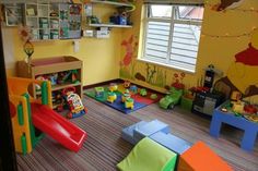 a child's play room with toys and decorations