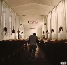 a man is walking down the aisle of a church with pews on both sides