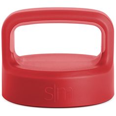 a red rubber kettle with the word sn on it's side and an orange handle