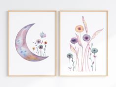 two watercolor paintings of flowers and the moon are hanging on a white wall above them