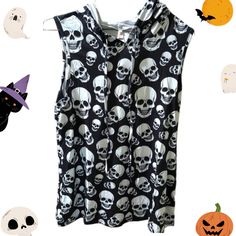 Nwt Sleeveless Hooded Skull Tee Shirt. Size Medium. Black And White Allover Skull Print. Hooded With Drawstring, Sleeveless. Lightweight. 65% Cotton Your 35% Polyester Approximate Measurements Pit To Pit 18” Length 27” Casual Sleeveless Halloween Top, Casual Halloween Tank Top, Black Cotton Tank Top With Skull Print, Casual Black Skull Print Tank Top, Casual Black Tank Top With Skull Print, Casual Halloween Skull Print Tank Top, Halloween Sleeveless Vest Top, Casual Halloween Vest Top, Casual Skull Print Tank Top For Streetwear