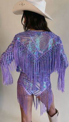 Handmade with sequin net fabric and sequin fringe trim, our Dakota Jacket is an attention getter. Sequin fabric drapes beautifully and shimmers and sparkles. Sequin fringes alongside the bottom of the sleeve, in in a v-shape in the front and back. Cropped sleeves. Jacket hits at the high waist. Shown with Dallas Bottoms, Dallas Bra, Jewel Cowboy Hat, Sequin Rodeo Skirt, Disco Bra in Solid Sequin, Save A Horse Skirt, Giddy Up, Starry Night Cowboy Hat, Disco Bottoms in Solid Sequin. Cowgirl Clubbing Outfits, Festival Looks Outfits, Rodeo Outfits Men, Eastnwest Label, Space Cowboy Costume, Rave Cowgirl, Rodeo Skirt, Disco Rodeo, Festival Costume