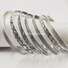 7 Design Bangles, bangle bracelet set, 925 Silver Bangle, Stacking Bangles, Stacking Bangle, Handmade Bangles, Designer Bangles, Women Bangles 👉👉 Item Details 7 Set of Bangles Metal: 925 Sterling Silver Purity: 925 Parts Per 1000 Silver Polish: High Ring Size: All Size Available 👉👉 Wearing silver jewelry is proved in fighting infection and preventing yourself from cold and flu,  and many kinds of bacteria and viruses. Silver helps expand blood vessels elastic. This condition makes it possible for the quick formation of bones and healing of the various parts of body from wound to bruises. 👉👉 FEEDBACK Feedback & DSR (Detailed Seller Ratings). We strive for 100%Customer Satisfaction and we love to leave positive feedback's for our buyers. Negative feedback is not a solution. So, we requ Silver Stackable Bohemian Cuff Bracelet, Bohemian Silver Stackable Cuff Bracelet, Bohemian Sterling Silver Stackable Bangle, Silver Bohemian Stackable Jewelry, Vintage Silver Stackable Cuff Bracelet, Vintage Silver Stackable Bangle, Silver Round Bohemian Bangle, Bohemian Sterling Silver Round Bracelet, Bangle Stacking