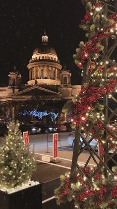 christmas trees in front of the state capitol building