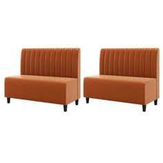 two orange chairs sitting next to each other