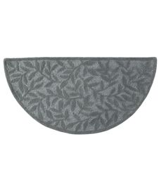 an oval shaped gray rug with leaves on it's sides and the bottom half