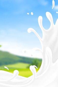 milk splashing into the air on a sunny day