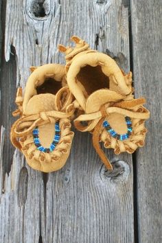 Baby moccasins baby shower gift set beaded leather | Etsy Handmade Bohemian Moccasins With Round Toe, Bohemian Handmade Round Toe Moccasins, Leather Moccasins With Soft Sole As Gift, Handmade Bohemian Closed Toe Moccasins, Beaded Baby Moccasins, Baby Boy Moccasins, Leather Medicine Bag, Toddler Moccasins, Baby Props