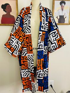 This tribal print duster kimono is made with the 100% cotton African wax  print.  It's a must have piece that can be styled in different ways, you can rock it over a fitted dress, skirt, shorts or pants.   Is a free size Patterned Cotton Kimono With Kimono Sleeves, Summer Kimono With Abstract Print And Kimono Sleeves, Multicolor Cotton Kimono For Festival, Casual Multicolor Print Kimono, Oversized Cotton Kimono For Festivals, Cotton Festival Kimono One Size, Traditional Patterned Summer Kimono, Traditional Cotton Patterned Kimono, Traditional Patterned Cotton Kimono