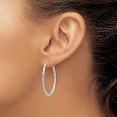 Rhodium over 14k white gold polished and textured hoop earrings. Measure approximately 1 3/8"L x 1/16"W and have saddleback backings. Medium Hoop Earrings, Bow Jewelry, Gold Satin, Large Hoop Earrings, Sterling Silver Hoop Earrings, White Earrings, Gold Polish, Fine Jewelry Gift, Sterling Silver Hoops