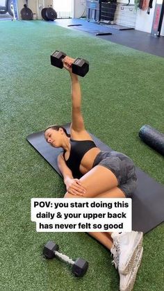 a woman is doing exercises on a mat with dumbbells in front of her and the caption reads pov you start doing this daily & your upper back has never felt so good