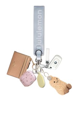 a key chain with two different items attached to it, including a cell phone and wallet