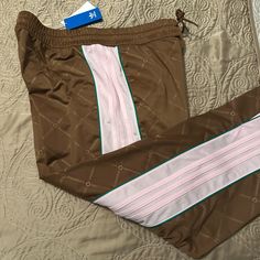 Nwt Track Pants Ladies Size 1x Brown/Pink/Green Designer Split Opening At Leg 1 Back Zipper Pocket Casual Adidas Pink Pants, Adidas Casual Pink Pants, Pink Adidas Pants For Loungewear, Casual Pink Adidas Pants, Pink Stretch Adidas Bottoms, Fitted Pink Adidas Bottoms, White Adidas Track Pants, Adidas Brown, Adidas Originals Logo