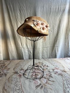 a hat that is sitting on top of a stand