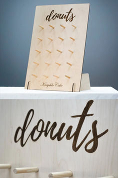 Create a standout dessert display with this customizable wooden donut stand, perfect for events and parties. The collapsible design ensures easy setup, storage, and transport. Ideal for weddings, birthdays, or any celebration. wooden donut stand, customizable treat stand, collapsible dessert display, donut holder for parties, event decor, wedding donut stand, portable treat stand, wooden dessert display, party donut holder, unique dessert decor Donut Holder, Dessert Decor, Donut Display, Donut Stand, Wedding Donuts, Sticker Organization