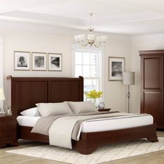 a bedroom scene with focus on the bed and dresser